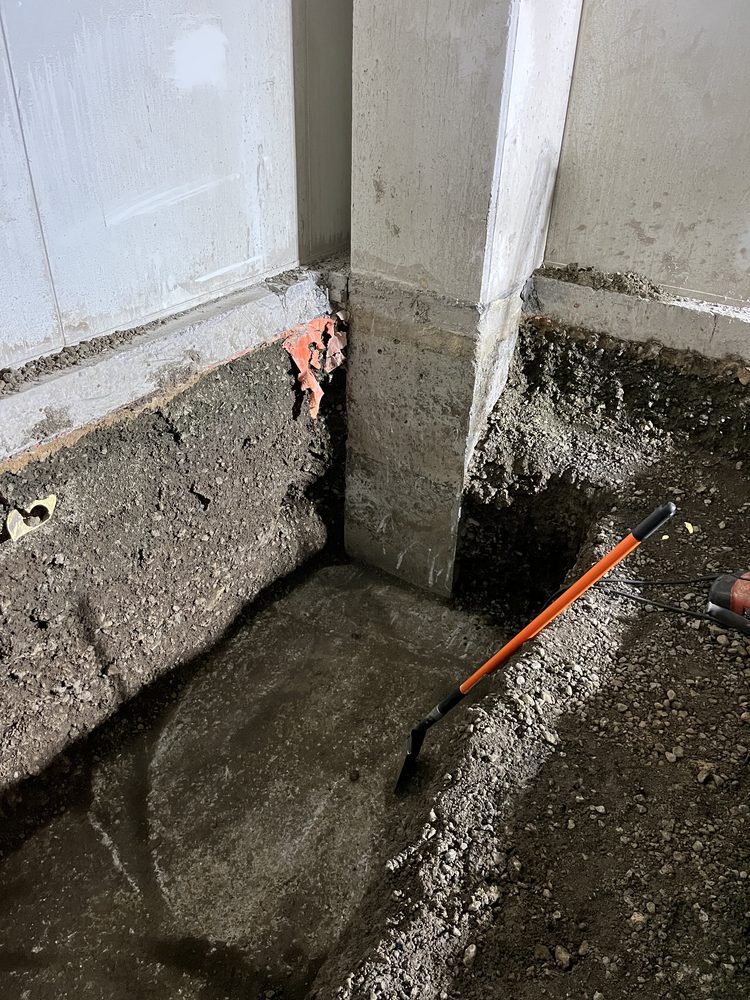 Excavation and underpinning works at a concrete column footing on a commercial site