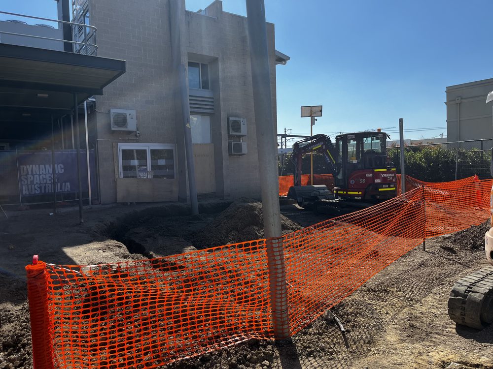 Dynamic Spaces Australia crew setting formwork and steel reinforcement for a concrete slab